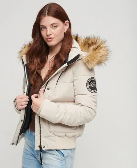Superdry Women's Women's Fully Lined Embroidered Badge Hooded Everest Puffer Bomber Jacket, Beige, 